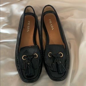 Prada black leather round toe loafers.